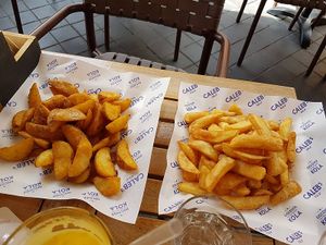 fries and potato wedges on the side (baked in plant based oil) at Pistache in Valkenburg