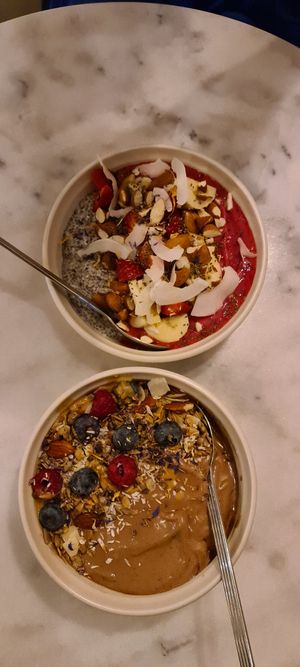 Top: Chia pudding/smoothie bowl. Bottom: Choco/peanutbutter smoothie bowl at Den Lille Smalle in Odense