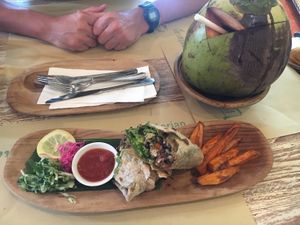 Burrito and whole young coconut  at Earth Cafe and Market in Seminyak
