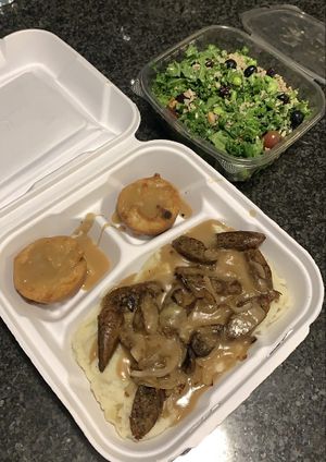 Sausages with mashed potatoes and superfood salad at FGF VEGAN - Famous Good Food in Oshawa