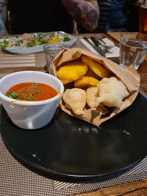 Polenta and dough balls with homemade tomato sauce   at Da Vinci Italian Restaurant in Aberdeen
