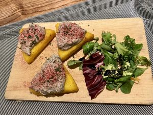 Fried polenta with mushrooms pate  at Da Vinci Italian Restaurant in Aberdeen