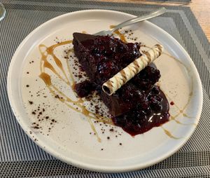 Chocolate cake with berry compote  at Da Vinci Italian Restaurant in Aberdeen