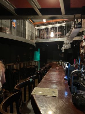 Empty restaurant with one shared menu  at Alf in Haifa