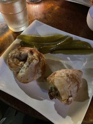 Tiny reheated apps the size of half a pickle (20ILS)  at Alf in Haifa