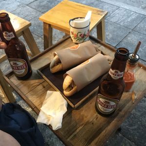 Mushroom banh mi and beer at Banh Mi 25 in Hanoi