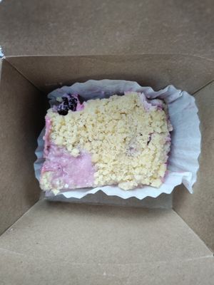 Super good raspberry cheesecake bar! at The Wild Oat in Bellingham