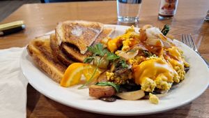 Tofu "egg" scramble with veggies. Veg cheese, potatoes, toast etc. at The Wild Oat in Bellingham