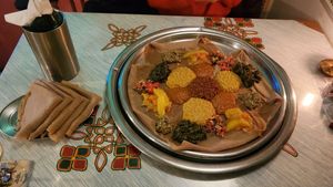 Vegan plate for 3 with injeras at Bejte Ethiopia in Berlin