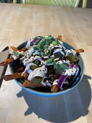 Floriade special with sweet potato fries and rendang based on veggies. Very tasty! at The Black Cockatoo in Almere