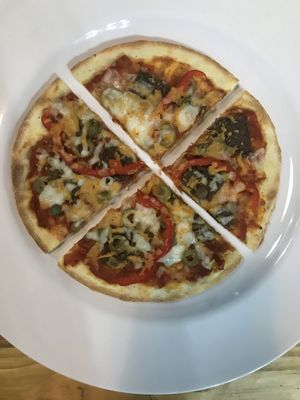 Pizza with homemade cheese (comes in 2 sizes, this is the small one) ❤️ at Vegan Beets in Hoi An