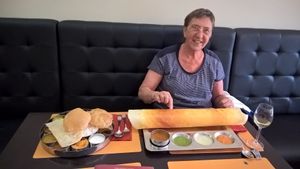 left the South-Indian thali, right with my wife laughing the fine dosa masala with ghee at Krishna Vilas in The Hague