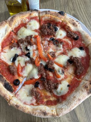 The Omni beef pizza with vegan cheese  at The Hungry Wolf in Koh Samui
