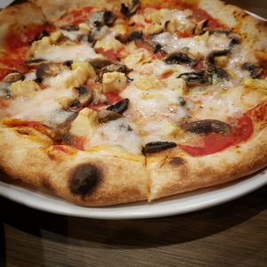 An amazing vegan pizza with melting veg cheese?? wow at The Hungry Wolf in Koh Samui