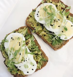 Possibly the BEST avocado toast ever! With or without egg! All on the tastiest gluten free bread ever! This is one of the most popular items on the menu. A must treyt. A delicious breakfast/lunch or snack filled with protein and essential fats to fuel your day.   at The Wellness Refinery in Sauble Beach