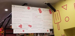 Menu couple vegan options, clearly marked  at Churn Soft Serve in Buffalo