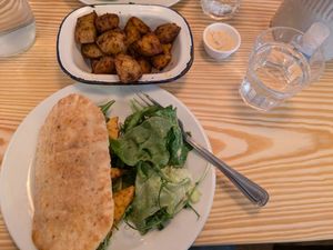 Amazing miso maple tofu brunch roll (gluten free) and paprika potato wedges at The Honey Pot in Penzance