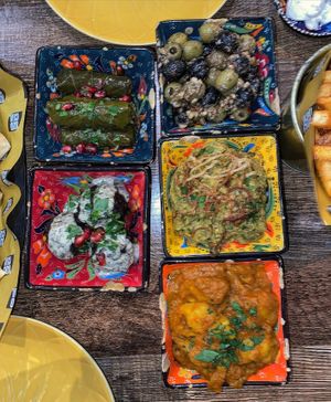 Stuffed vine leaves, olives, potato stew,   at Koocha Mezze Bar in Bristol
