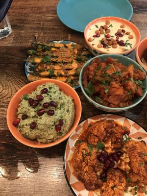 Artichoke dip, spiced cauliflower, okra fries, hummus, spiced potato   at Koocha Mezze Bar in Bristol