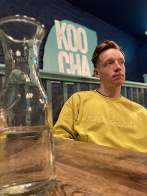 A vegan man in a vegan restaurant  at Koocha Mezze Bar in Bristol