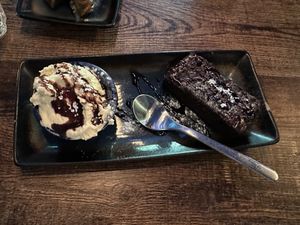 Warm Brownie and whipped cream   at Koocha Mezze Bar in Bristol