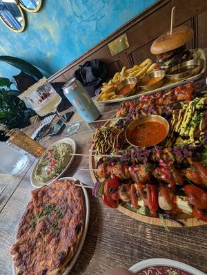 Burger & fries, artichoke dip & mixed grill at Koocha Mezze Bar in Bristol
