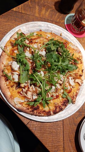 Yummy pizza with nut cheese, mushrooms, cauliflower and rucola!! at Otomat in Leuven