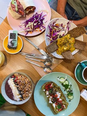 Vegan quoina beetroot wrap, vegan scrambled eggs, acai energy bowl, vegan avocado feta toast. Really yummy! at Happy Blender in Athens