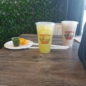 Wheat grass shot, minty pineapple lemonade and vegan horchata at Guacamaya Oasis in Downey