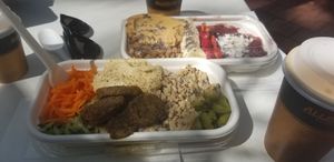 We had the Sunny Bowl and The Penut Butter solution plus oat latte and oat turmeric latte. at 27 Degrees in Palm Cove