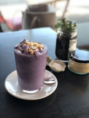 Blueberry smoothie made on almond milk at Equium Social in Newcastle