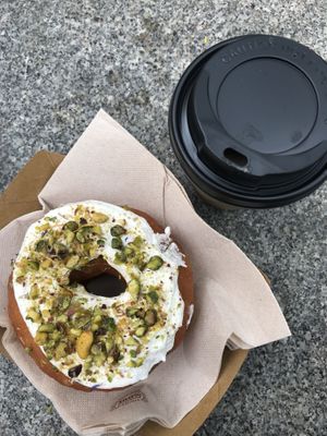 Pistachio Donut and Oatly Latte  at Vegan Bowls in Barcelona