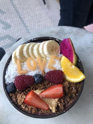 açaí bowl served in coconut at Vegan Bowls in Barcelona