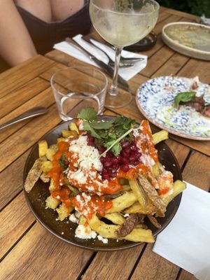 Loaded za’atar fries
Friet, za’atar, feta, granaatappel, lichtpittige paprika saus, zhug, peterselie. On the Small plates menu but a great portion for 8.95! Tasty  at GYS - Amsterdamsestraatweg in Utrecht