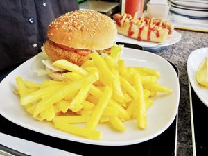Veggie XL-Burger with fries and hotdog at Formosa Food in Vienna