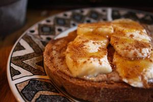 Delicious almond butter banana cinnamon toast on locally made sourdough bread. at Garden Song in Roanoke