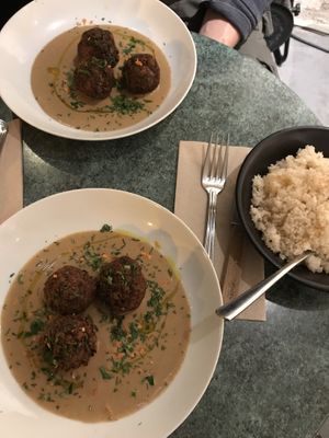 Delicious Bean balls in peanut butter sauce. With rice. at Table Metis in Paris