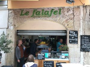 The guy in blue is the owner . So so so
original and warm hearted!  at Le Falafel in Nice