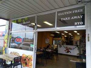 Shopfront and interior showing seating and counter at Italia Pizza & Pasta in Currimundi