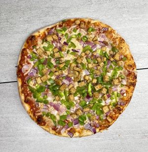 Vegan Chick'n Tikka Masala Pizza at Troy's Italian Kitchen in Arlington