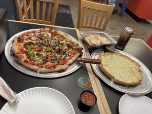 Vegan pizza, chicken parm pasta, cheese bread   at Troy's Italian Kitchen in Arlington