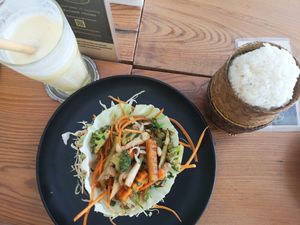 Vegy Laab with sticky rice and a pineapple shake! at Happy Mango in Vang Vieng
