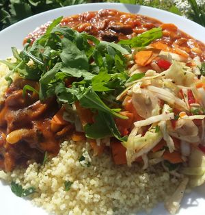 Vegan stew, couscous and cabbage salad at Kawiarnia Stol Powszechny in Warsaw