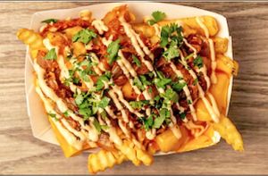 Loaded Kimchi Fries  at Go Vegan San Antonio in San Antonio