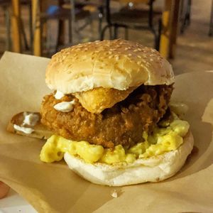 Fried chicken style seitan burger with mac and cheese. Our fave dish! 💕 at The Birds in East London