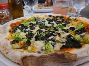 Primavera pizza with vegan cheese at Il Focolaio in Montreal