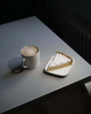 Lemon pie and cappuccino  at Puhuri By Tartine in Helsinki