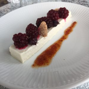 Vegan cheesecake with blackberries and raw cookie chunks!! at Holistic Cafe in Nakatsu