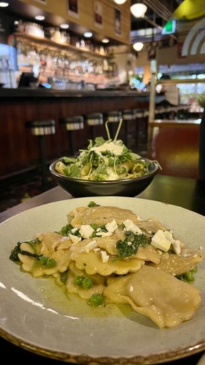 Umami pillows aka eggplant and tomato stuffed agnolotti, vegan feta, miso butterr  at The Moon in Northbridge