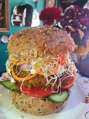 Cajun, Pumpkin, Zucchini, Chickpea burger with fresh salad, Jamaican Pineapple sauce and garlic aioli. at Good Golly Miss Polly in Burra
